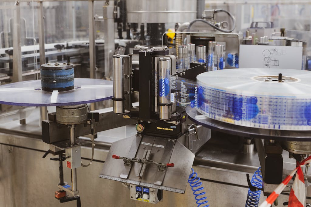 Close-up of automated machinery in a Lipik factory's production line.